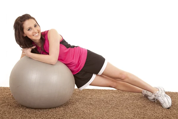 Woman fitness ball side lay happy — Stock Photo, Image