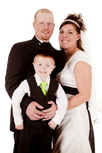 Bride and groom with little boy — Stock Photo, Image