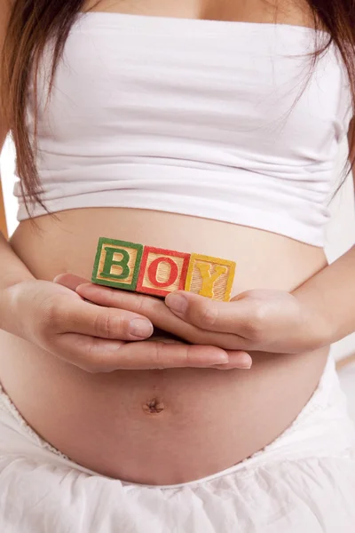 Pregnant blocks boy front — Stock Photo, Image