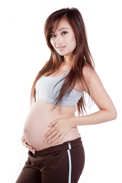 Traje de fitness embarazada sonrisa — Foto de Stock