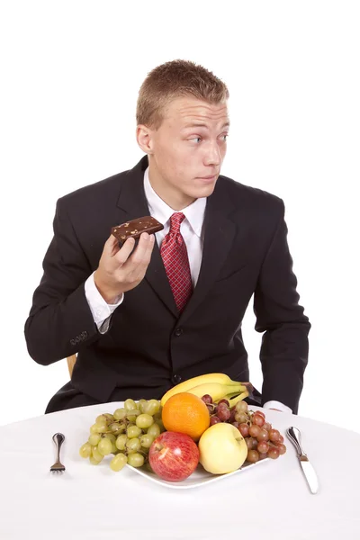 Sneaking a brownie — Stock Photo, Image