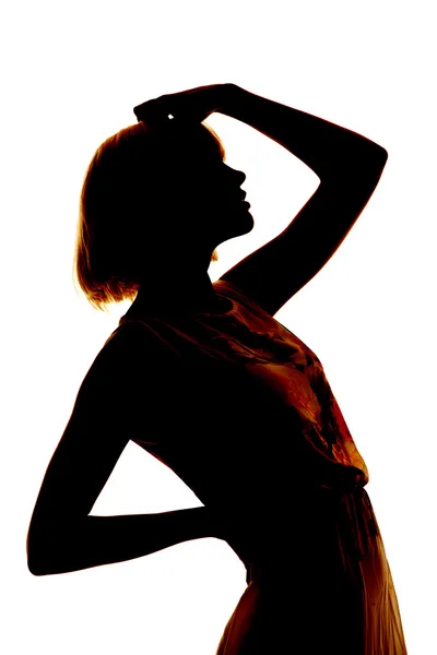 Woman hand on head and back silhouette — Stock Photo, Image