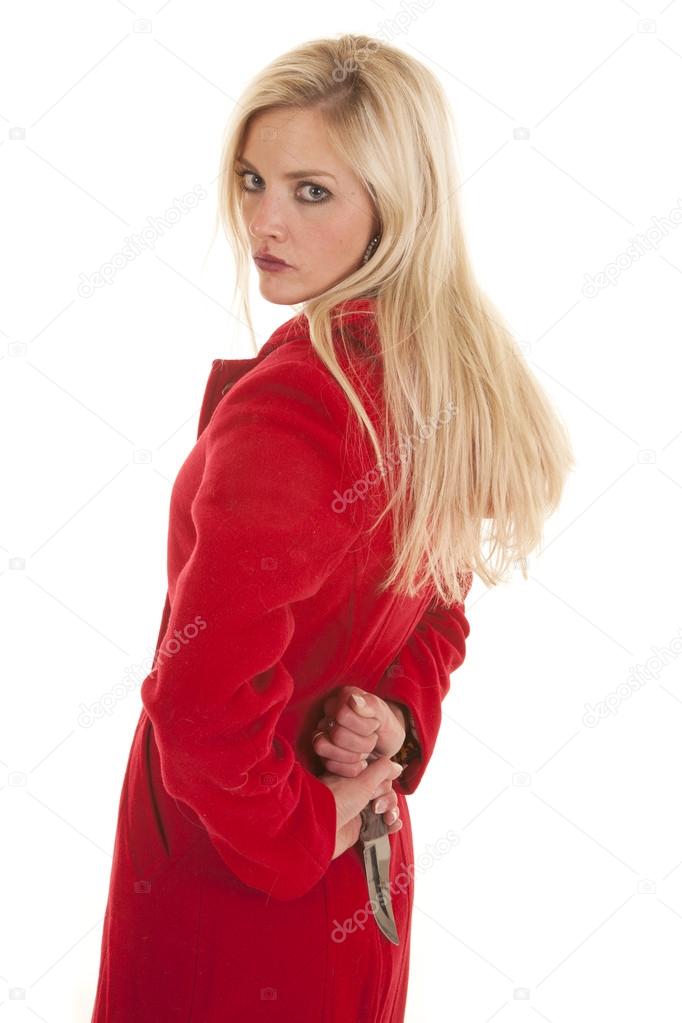 Woman red jacket knife behind back