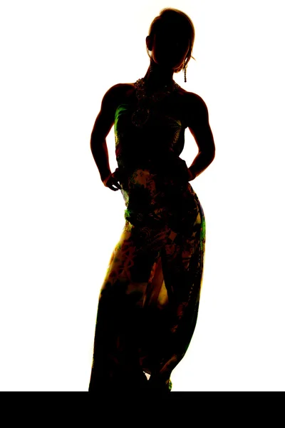 Silhouette woman long dress facing — Stock Photo, Image