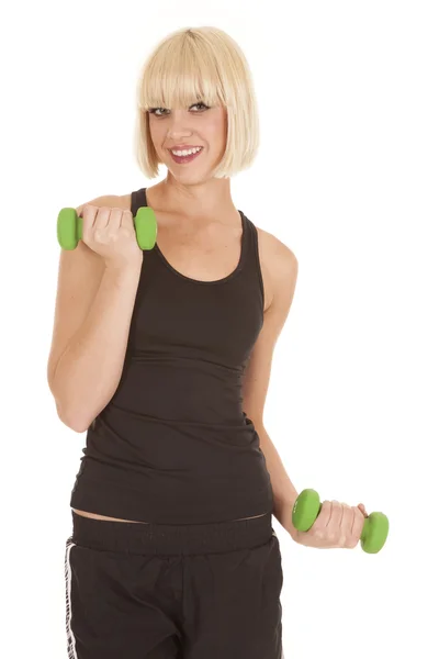 Vrouw zwarte fitness tank glimlach curl — Stockfoto