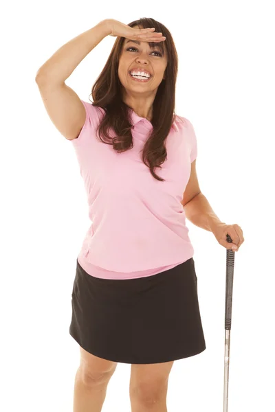 Kobieta koszula różowy golf trzymać, szukam — Zdjęcie stockowe