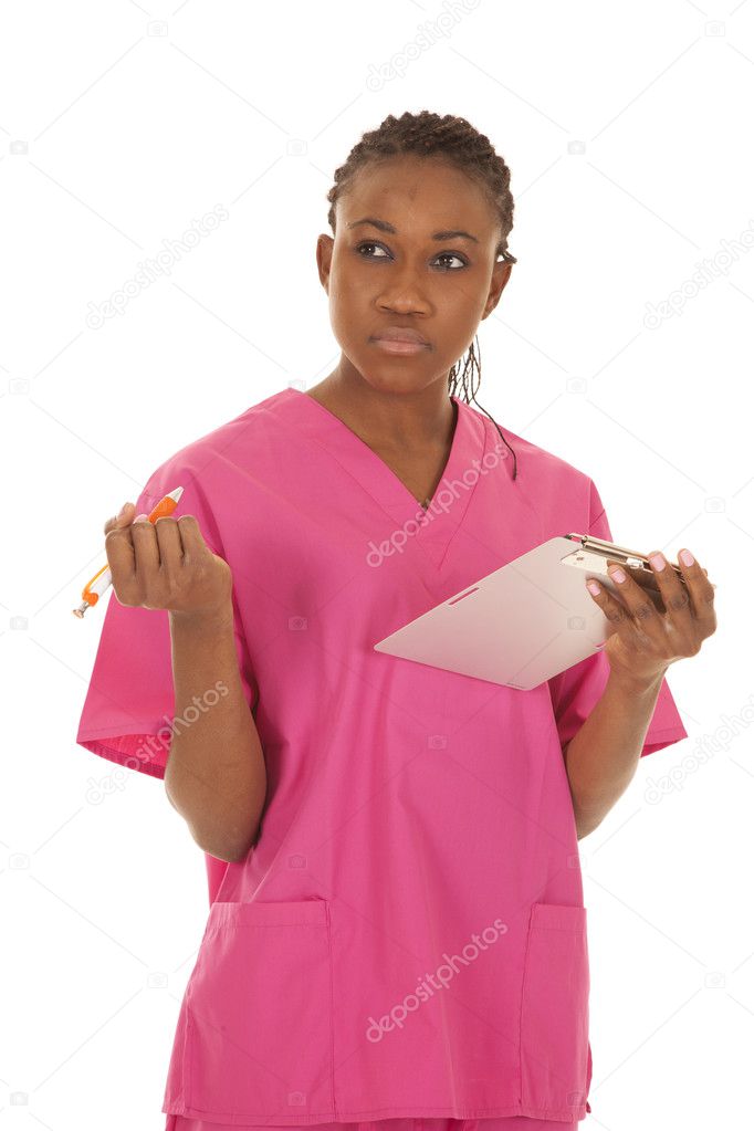 Woman pink scrubs notes look side