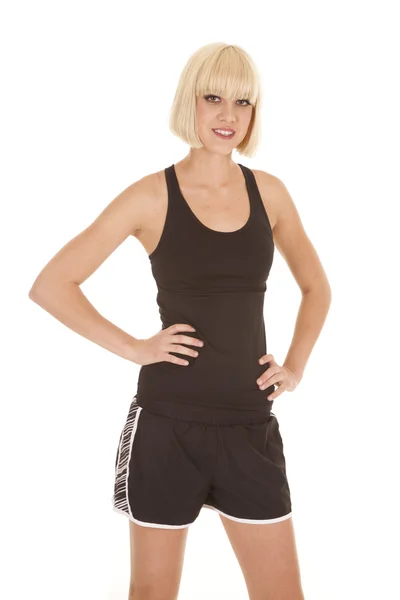 Woman black fitness outfit stand smile — Stock Photo, Image