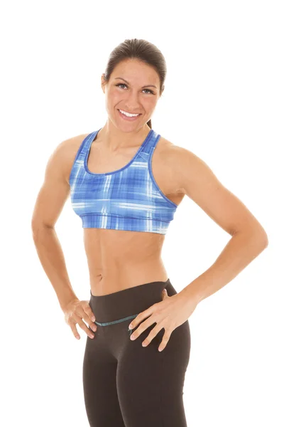 Woman blue plaid halter top hands on hips — Stock Photo, Image