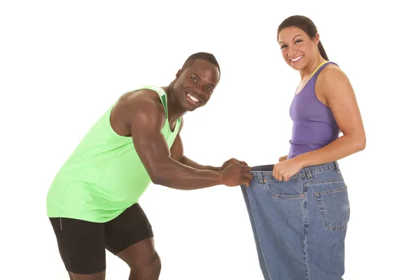 Fitness man woman big pants — Stock Photo, Image