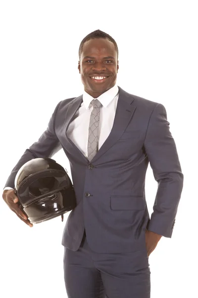 Hombre de traje sosteniendo la sonrisa del casco — Foto de Stock