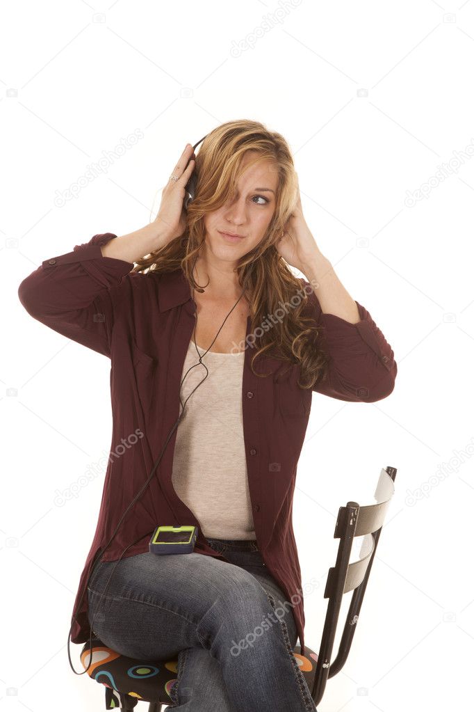 woman headphones sit look side