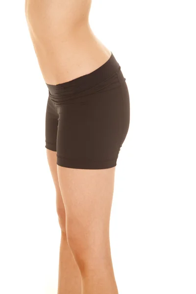 Ciało dama fitness czarne spodenki skóra — Zdjęcie stockowe