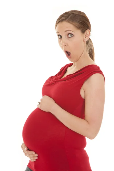 Pregnant woman red shirt side shock — Stock Photo, Image