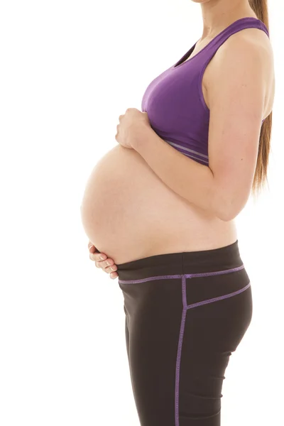 Pregnant fitness body hold belly — Stock Photo, Image
