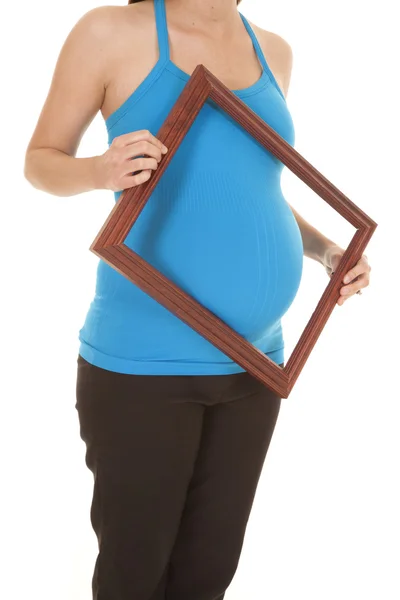 Pregnant woman picture frame by belly — Stock Photo, Image