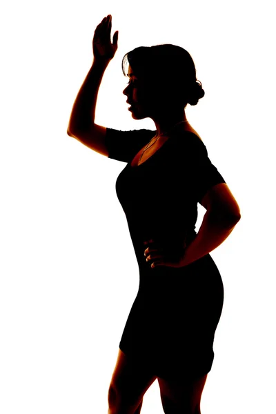 Silhouette of a woma waving — Stock Photo, Image