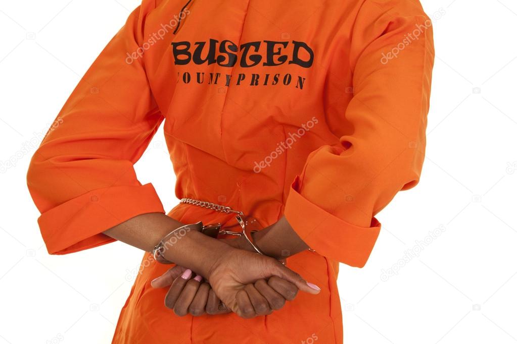 woman prisoner orange busted handcuffs back