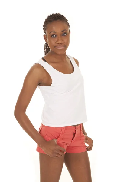 Kvinna fitness vita tank rosa shorts stå — Stockfoto
