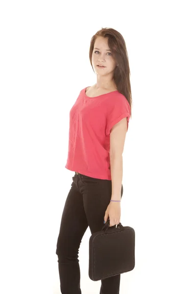 Teen girl holding on to a brief case looking — Stock Photo, Image