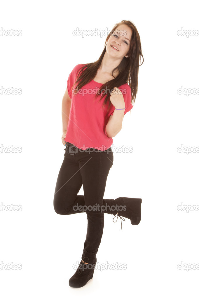 Teen girl with her foot up smile