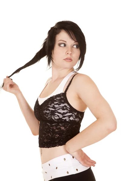 Donna pizzo superiore tenere i capelli guardare indietro — Foto Stock