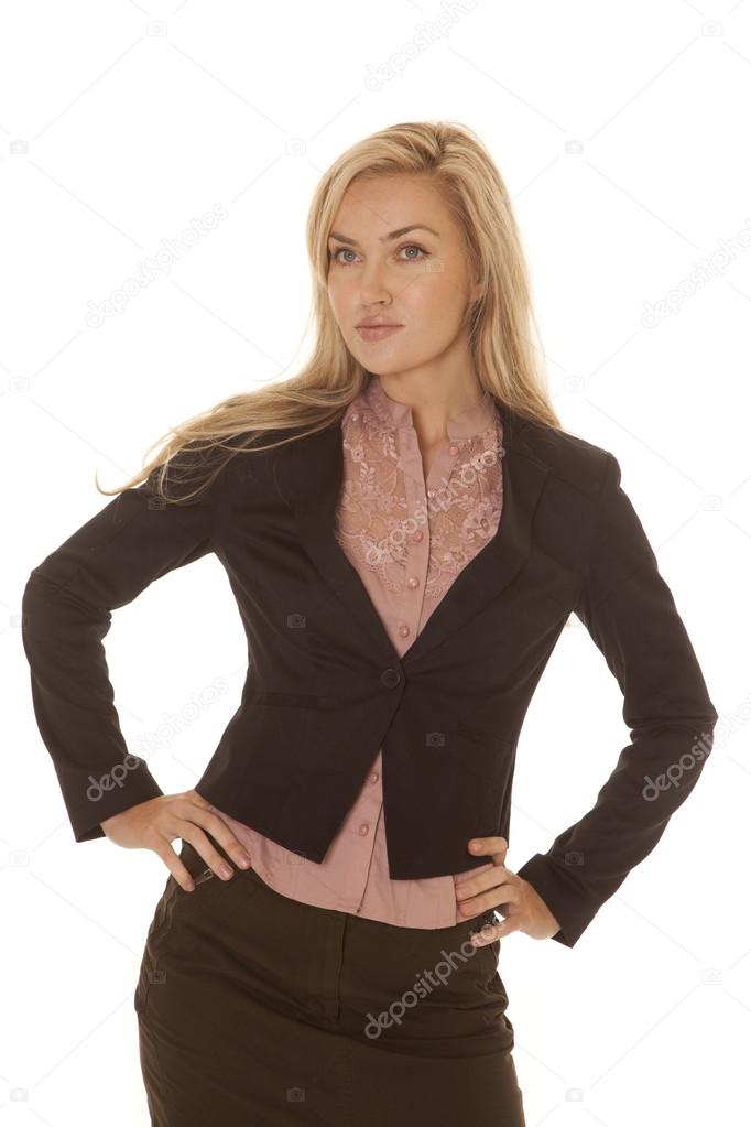 Woman blond black business dress hands hips