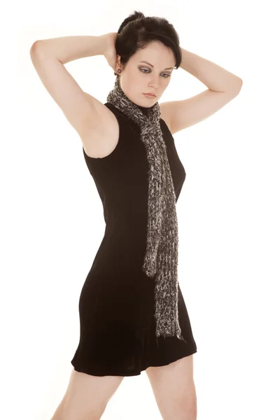 Woman black dress scarf hands back of head — Stock Photo, Image