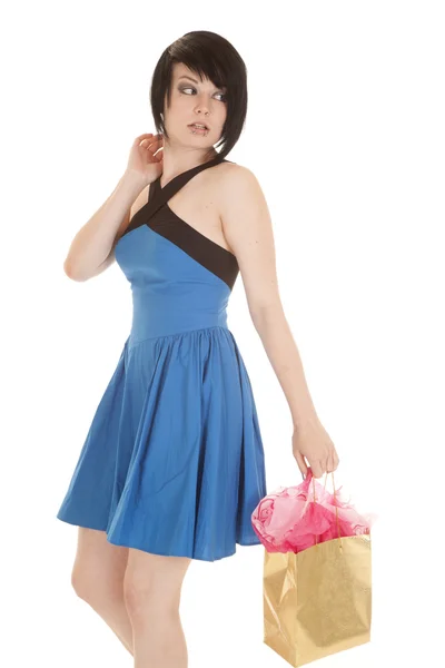 Woman blue dress piercings bag look back — Stock Photo, Image