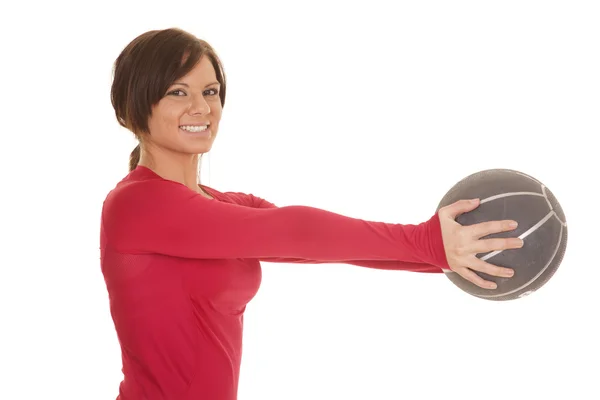 Fitness medicine ball red shirt hold out — Stock Photo, Image