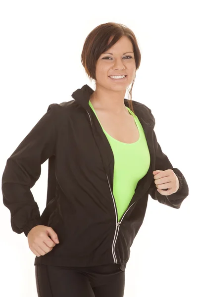 Woman green and black run side smile — Stock Photo, Image