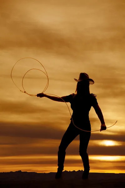 Silhouette cowgirl throw rope — Stock Photo, Image