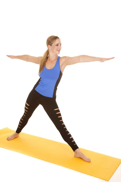 Woman fitness holy pants stretch to side. — Stock Photo, Image