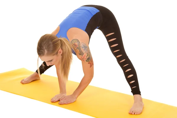 Woman fitness holy pants stretch to side. — Stock Photo, Image