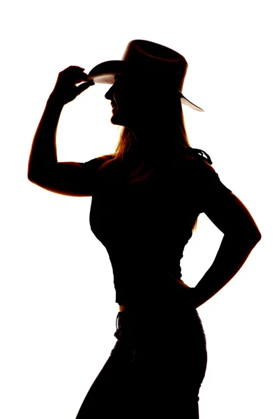 Silhouette femme cowgirl chapeau main côté fermer — Photo