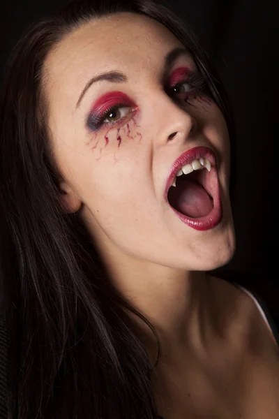 Woman vampire close head back — Stock Photo, Image