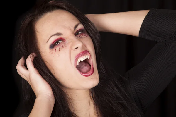 Vampire close fangs hands up — Stock Photo, Image