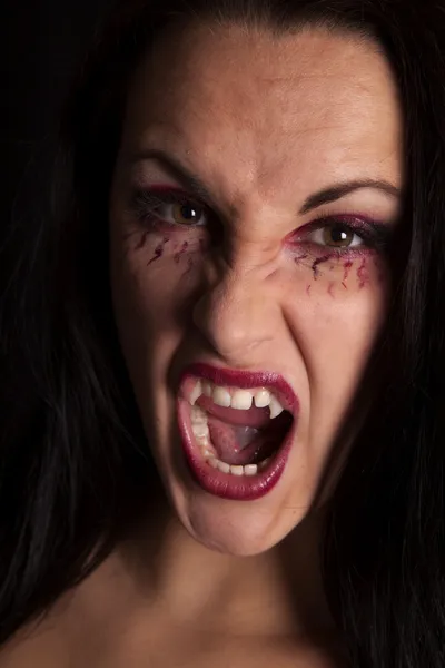 Woman vampire facing close — Stock Photo, Image