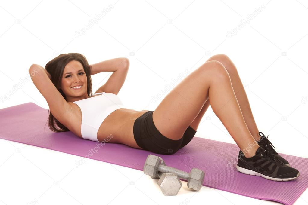 Woman white top fitness crunch smile
