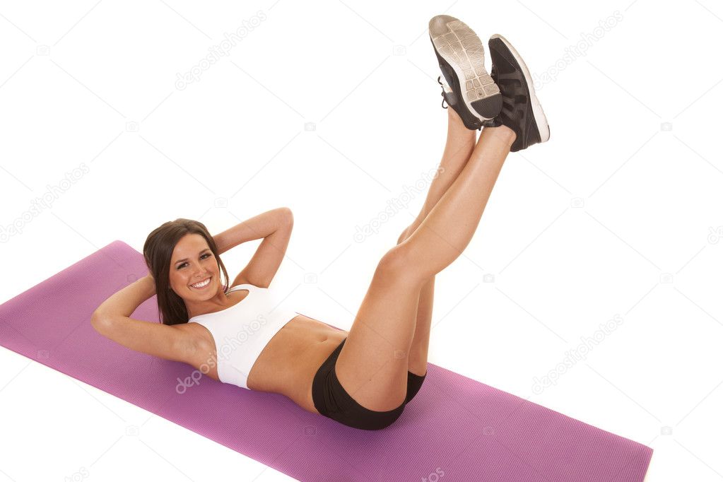 Woman white top fitness crunch legs up
