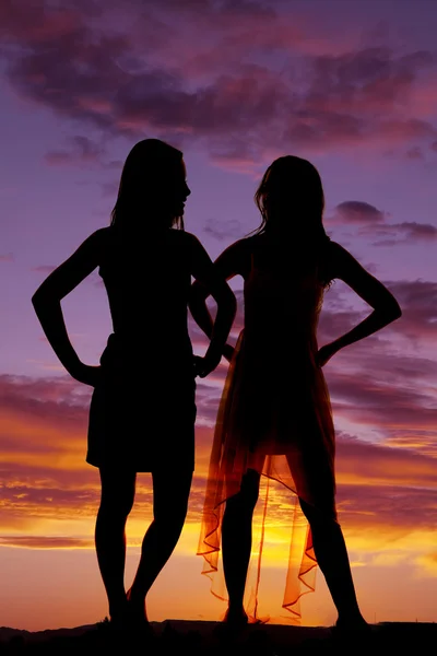 Silhouette two women stand together — Stock Photo, Image