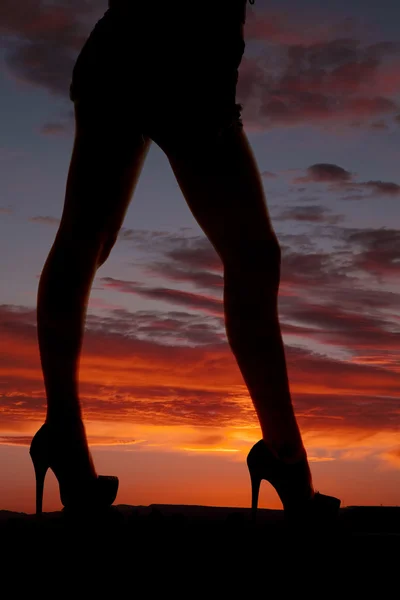 Silhouette nő lába arc oldalán — Stock Fotó