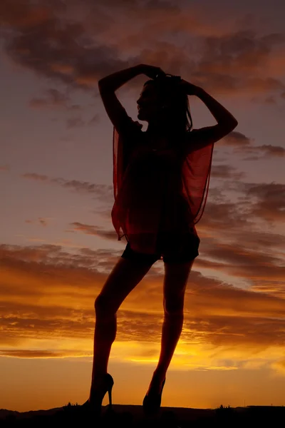 Silhouette woman stand hands hair knee out — Stock Photo, Image