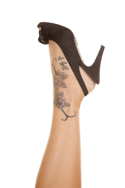 Woman leg tattoo on foot — Stock Photo, Image