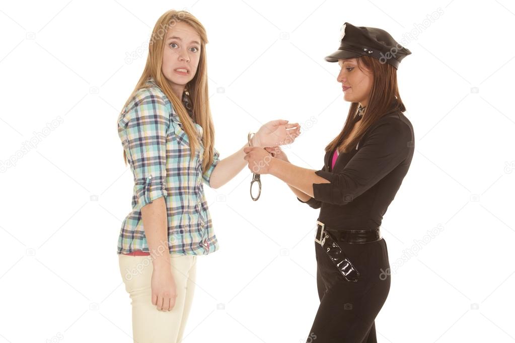 Woman cop handcuff woman upset