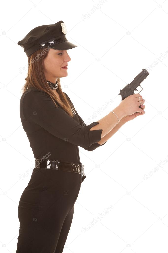 Woman cop hold pistol side