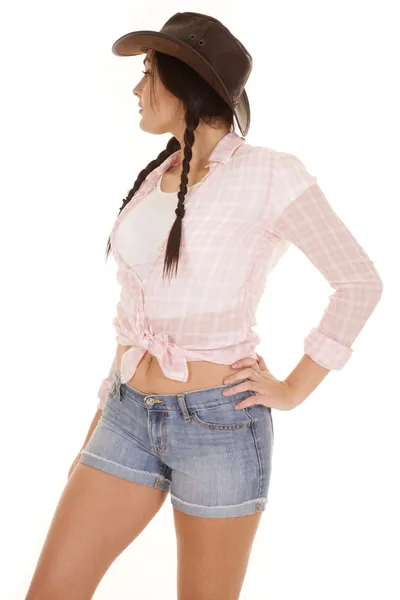 Flätor shorts rosa skjorta ser tillbaka — Stockfoto