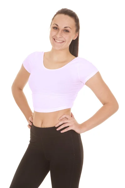 Mulher fitness branco top mãos quadris — Fotografia de Stock