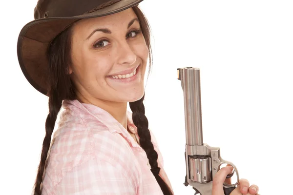 Vrouw geruite rooskleurig hemd kanon zoek glimlach — Stockfoto