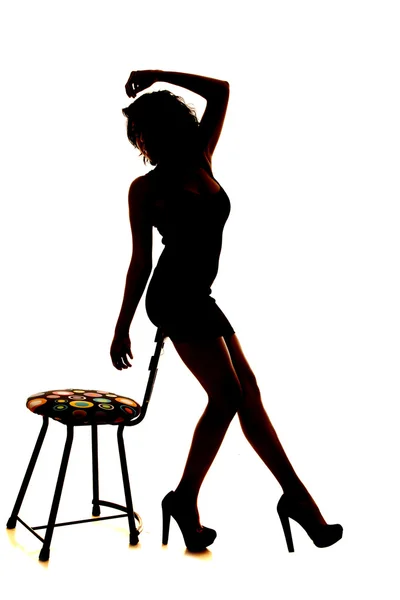Silhouette woman chair sit on back — Stock Photo, Image